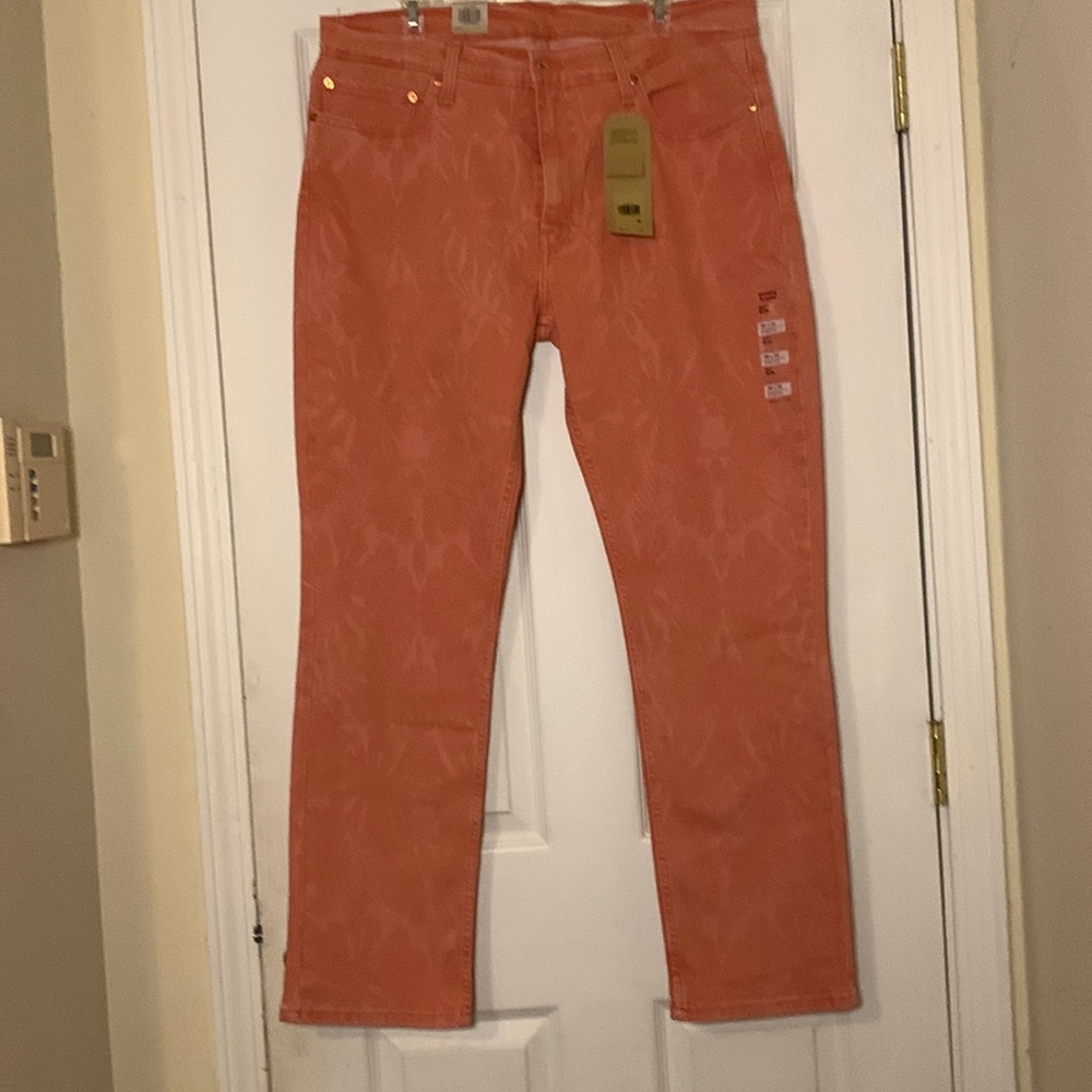 Levi’s 511 Slim NWT pink patterned jeans. 85% cotton size 38x32 gorgeous!